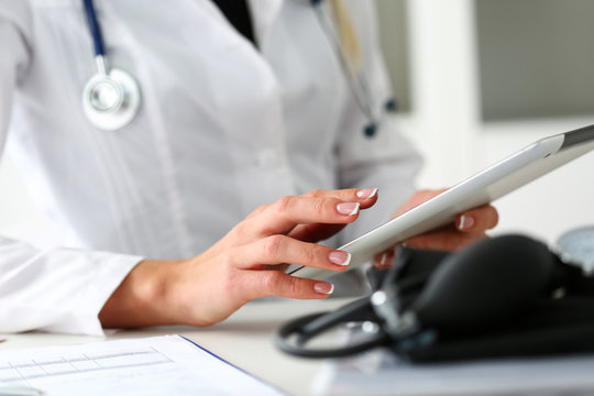 Female doctor hold digital tablet pc