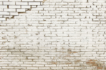 Old red brick wall with white paint background texture