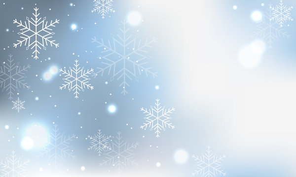 Winter blue banner with snowflakes and blurred circles.