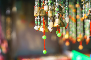 Colorful jewelry Myanmar Style with a beauty bokeh background.