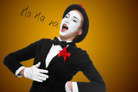Portrait of the surprised and joyful mime with open mouth
