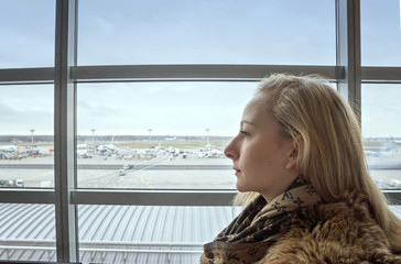 Portrait of a young woman at the airport