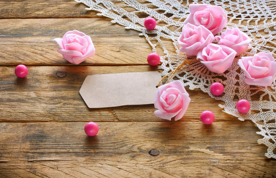 Valentine's day composition, paper tag, pink roses