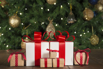 Christmas gifts on wood, Christmas tree background