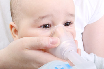 Baby boy gets inhaler treatment for cough