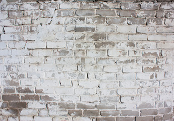 outdoor white wall of an old brick