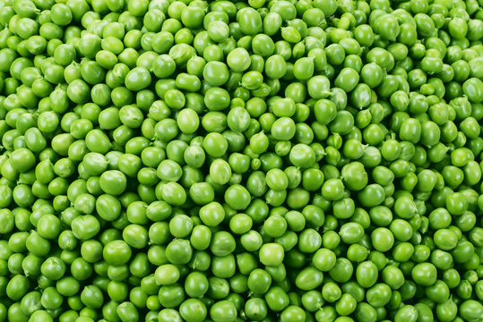 Fresh green peas background. Texture. Top view.