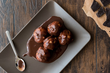 Profiteroles with chocolate cream.