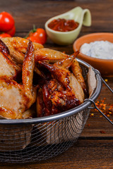 Baked chicken wings with sauce