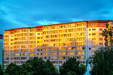 Fototapeta na wymiar Sunset against a building in eastern europe