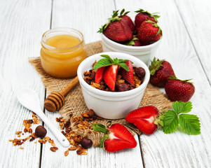 Homemade granola with strawberries