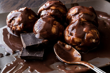 Profiteroles with chocolate cream.