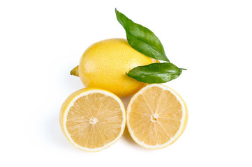 Lemon with leaves on white