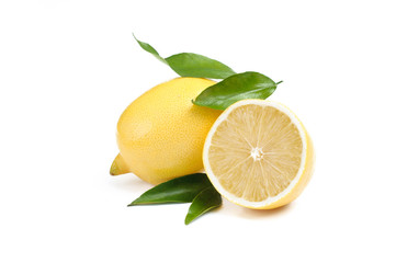 Lemon. Fruit with half and leaves isolated on white