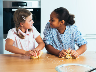 Children baking cookies