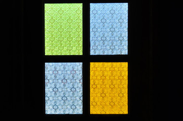 traditional window of malay house illuminate by the bright sun outside the house..