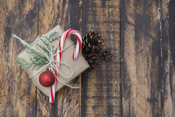Christmas gift box on dark wooden background
