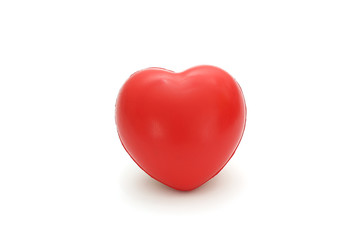 Isolated single simple red sponge heart on white background