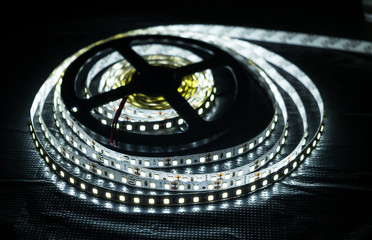Different LED strips on black background, glowing LED garland
