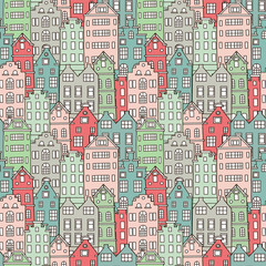 Seamless pattern with cute colorful houses. Vector illustration