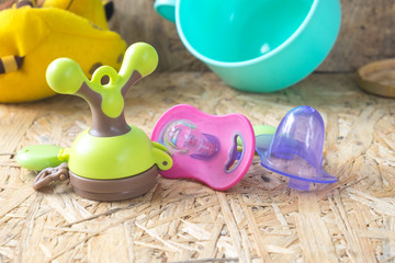 Fototapeta na wymiar pacifier and accessories for newborn