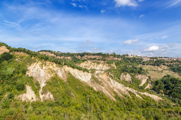 Civita di Bagnoregio, Italy. View of the mountains and the nearby town of Lubriano