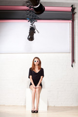 Young fashion model in 3d glasses