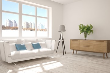 White room with sofa and urban landscape in window. Scandinavian interior design