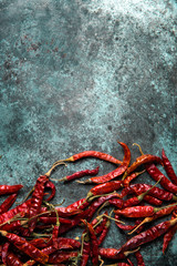 Red chili pepper,dried chillies on dark background. top view