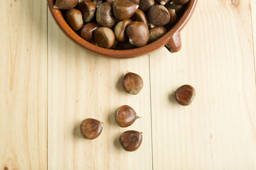 Chestnuts in an earthenware bowl.