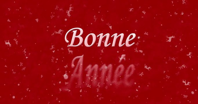 Happy New Year text in French "Bonne année" formed from dust and turns to dust horizontally on red animated background
