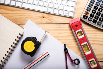 engineering objects on wooden table. top view
