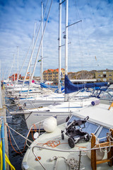 Obraz premium white yacht on the berth of the Swedish Smogen village