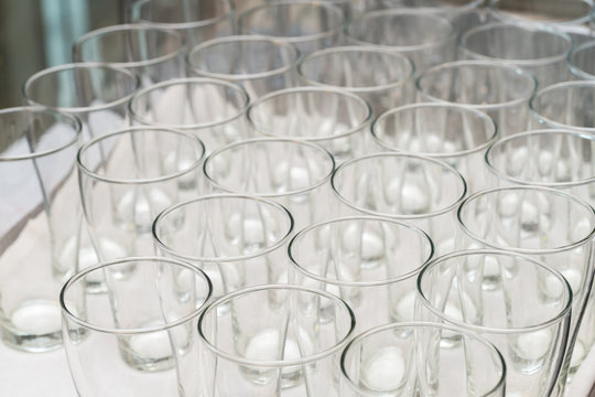 empty glasses on a banquet table close-up
