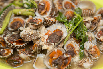 Fototapeta na wymiar Scallops mussels baked with butter and garlic in shell