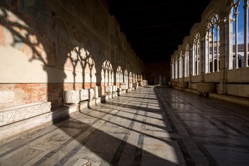 Shadows on the wall. Camposanto building in Pisa, Italy