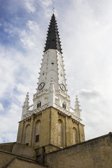 Fototapeta na wymiar Village of Ars en Re with Saint-Etienne church spire, Ile de Re, France