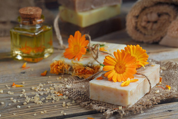 Obraz na płótnie Canvas Natural handmade soap with calendula (pot marigold)