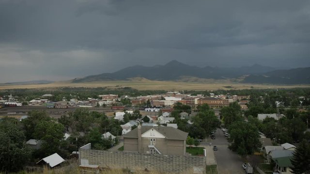 Small Western Town from Above with Storm Clouds