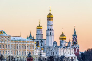 Ivan the great bell tower and Spasskaya tower. Moscow Kremlin. Winter morning and golden sky. © mzabarovsky