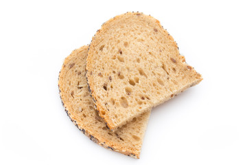 White bread sliced wholegrain bread on a wooden table.