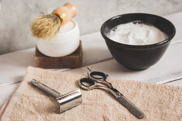 Mens hairdressing wooden desktop with tools for shaving