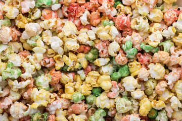 Colored Popcorn texture background. Sweet popcorn.