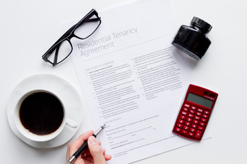 signing of agreement top view on white background
