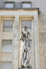 Fototapeta na wymiar Statue in front Facultade de Letras in Coimbra University, Portugal