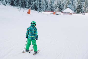 Fototapeta na wymiar Boy skiing