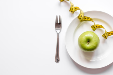 concept diet and weight loss on white background top view