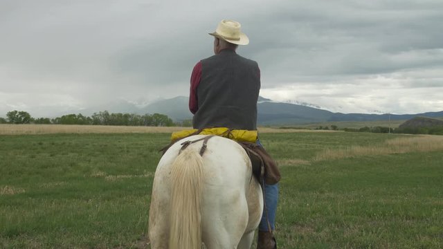 Senior cowboy on Horse -Rear - Dolly Left