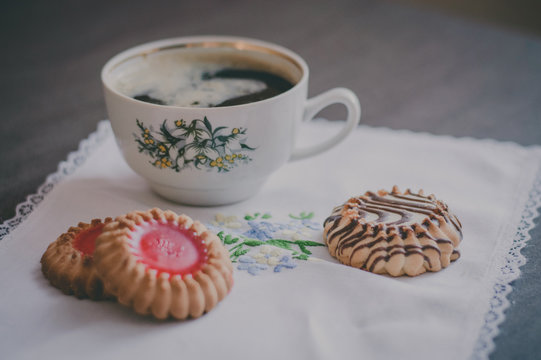 coffee Cup and cookies on a napkin with embroidery