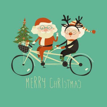 Cool grandma with grandpa as santa claus and reindeer riding a bicycle tandem